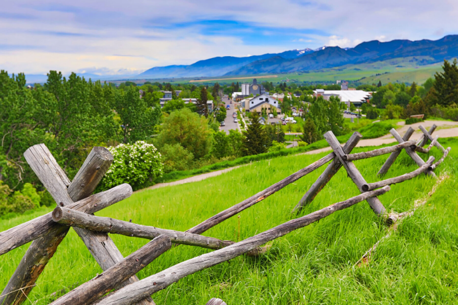 A wooden fence and overlook at Peet's Hill in Bozeman