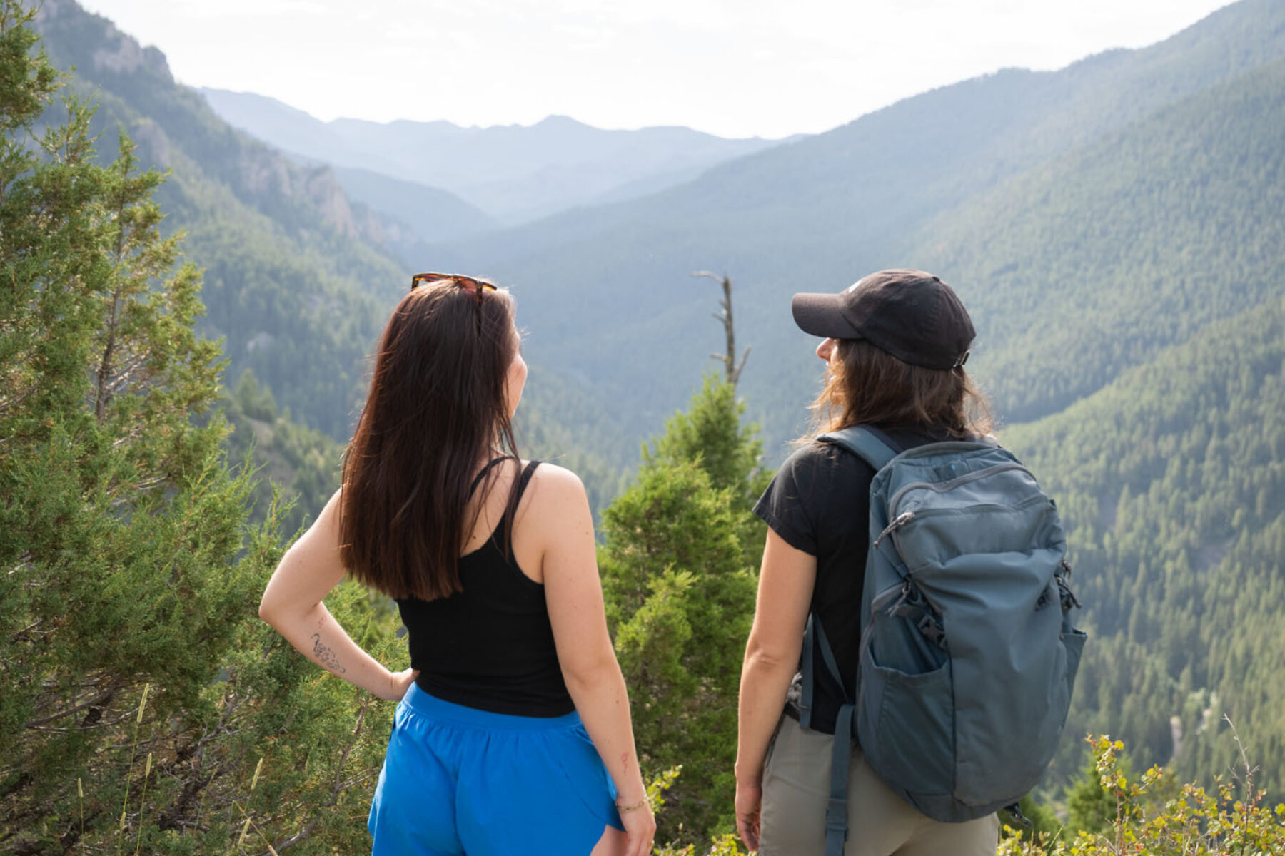 Two women enjoying a view in Montana during a hike